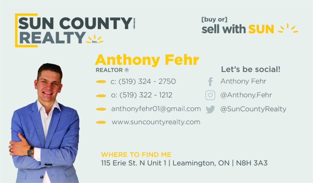 A business card for an agent in the sun county realty.